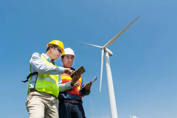 Engineer and Architect discuss over Digital Wireless Tablet and — Stock Photo, Image