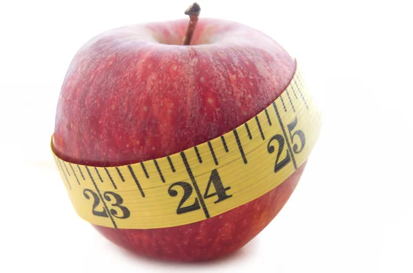 Health diet apple with tape measure — Stock Photo, Image