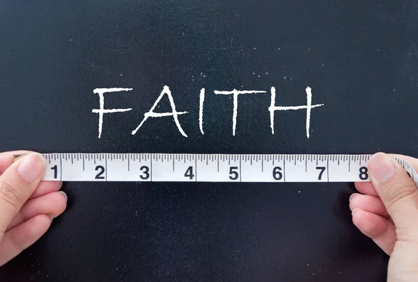 Tape measuring faith — Stock Photo, Image