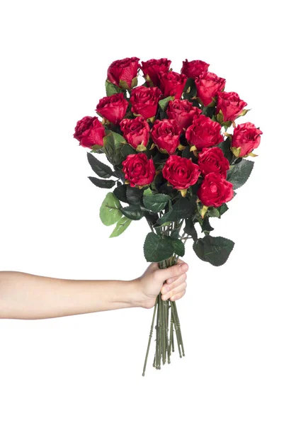 Kädestä tilalla kimppu punaisia ruusuja — kuvapankkivalokuva