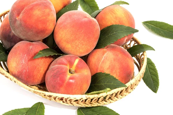 Peaches fresh new crop with leaves Stock Image