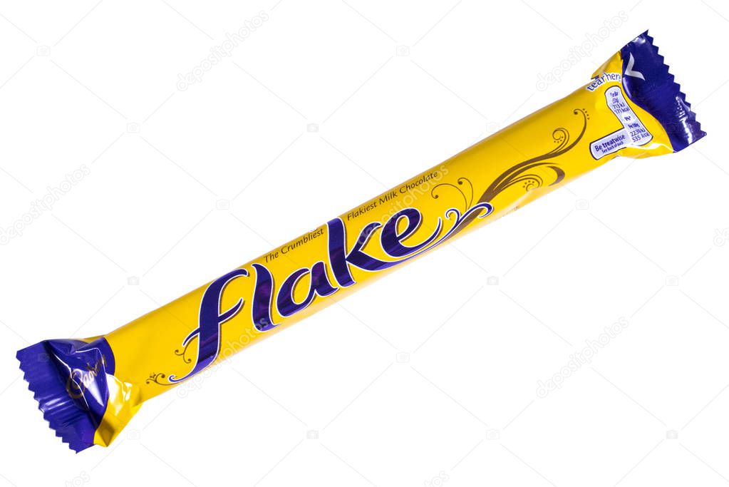 LONDON, UK - OCTOBER 13TH 2016: An unopened Flake chocolate bar manufactured by Cadbury, pictured over a plain white background on 13th October 2016.