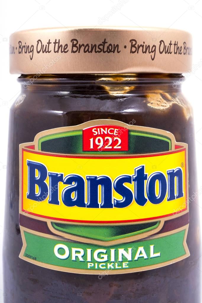 LONDON, UK - OCTOBER 13TH 2016: A close-up shot of a jar of Branston Pickle over a plain white background, on 13th October 2016.  The Branston food brand is now owned by Japanese company Mizkan.