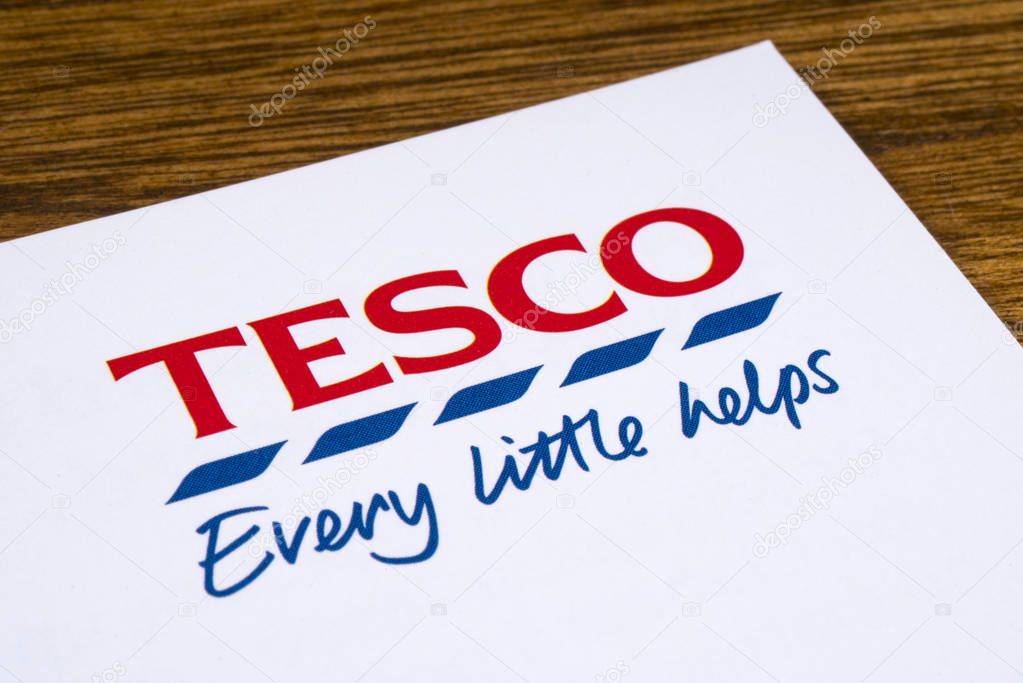 LONDON, UK - JANUARY 13TH 2017: A close-up of the Tesco logo and slogan on a promotional leaflet, on 13th January 2017.