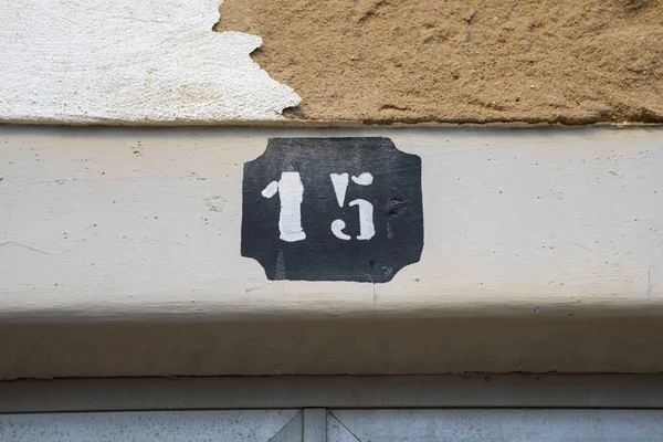 Número 15 en una pared — Foto de Stock