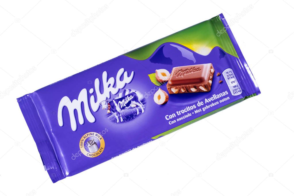 LONDON, UK - OCTOBER 10TH 2017: A studio shot of a Milka chocolate bar over a plain white background, on 10th October 2017.