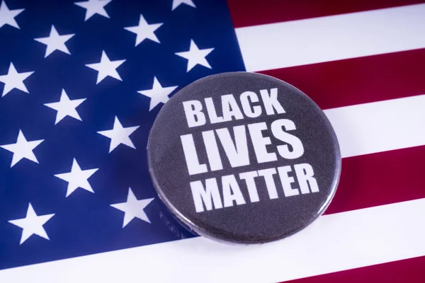 Μαύρο θέμα σήμα ζει πάνω από τη σημαία των ΗΠΑ — Φωτογραφία Αρχείου