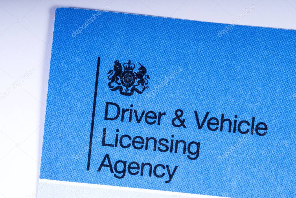 LONDON, UK - MARCH 27TH 2018: A close-up of the DVLA logo on an application form, on 27th March 2018.  The DVLA is the organisation of the UK government responsible for maintaining a database of drivers and vehicles in the UK.