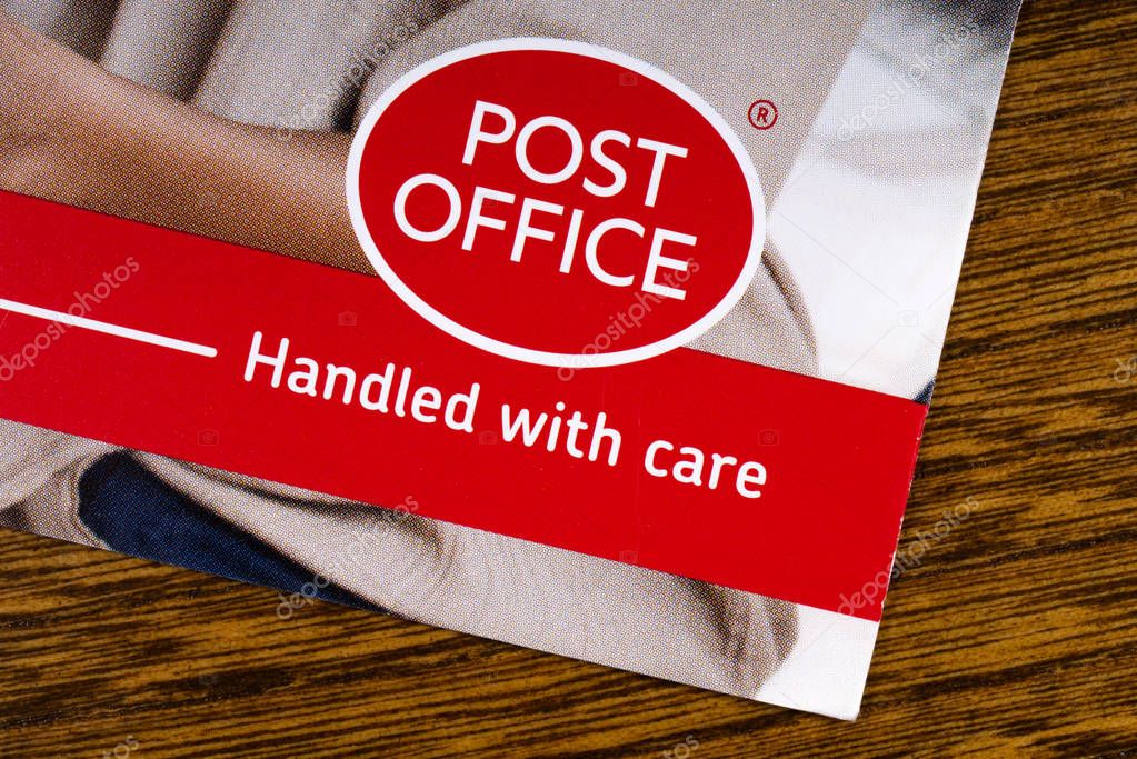 LONDON, UK - MARCH 27TH 2018: A close-up of the Post Office logo, pictured on an information leaflet, on 27th March 2018.  Post Office Ltd is a retail post office company in the UK.
