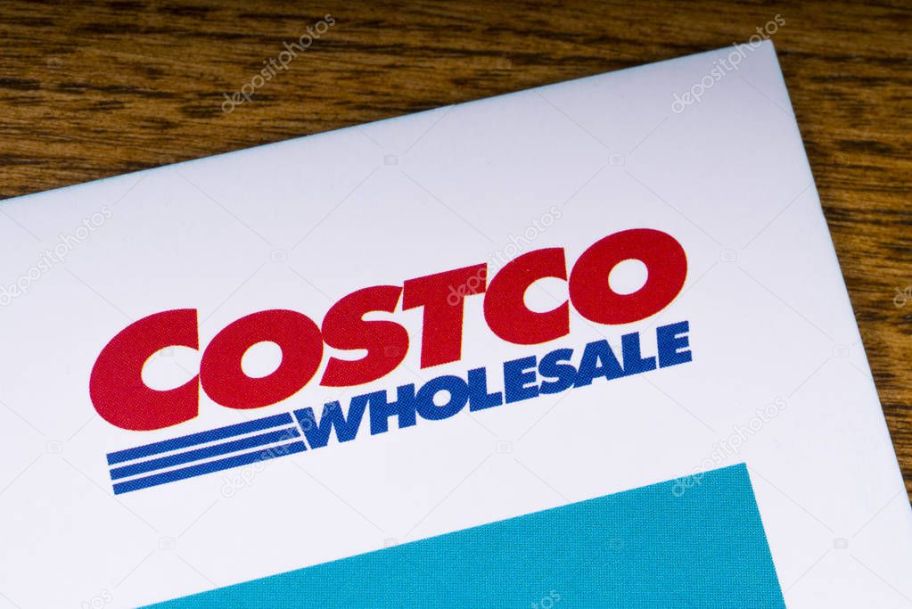 LONDON, UK - MARCH 27TH 2018: A close-up of the Costco Wholesale Corporation logo, pictured on an information booklet, on 27th March 2018.