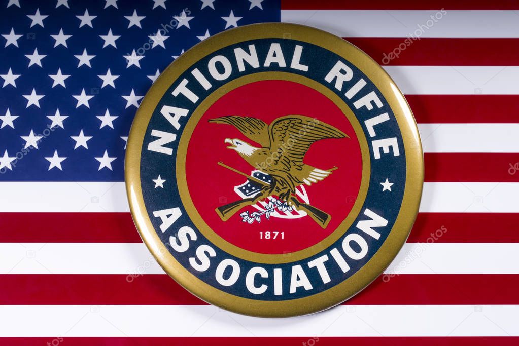LONDON, UK - MARCH 26TH 2018: The symbol of the National Rifle Association portrayed with the US flag, on 26th March 2018.