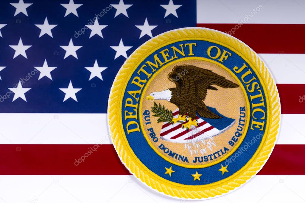 LONDON, UK - MARCH 26TH 2018: The symbol of the United States Department of Justice portrayed with the US flag, on 26th March 2018.
