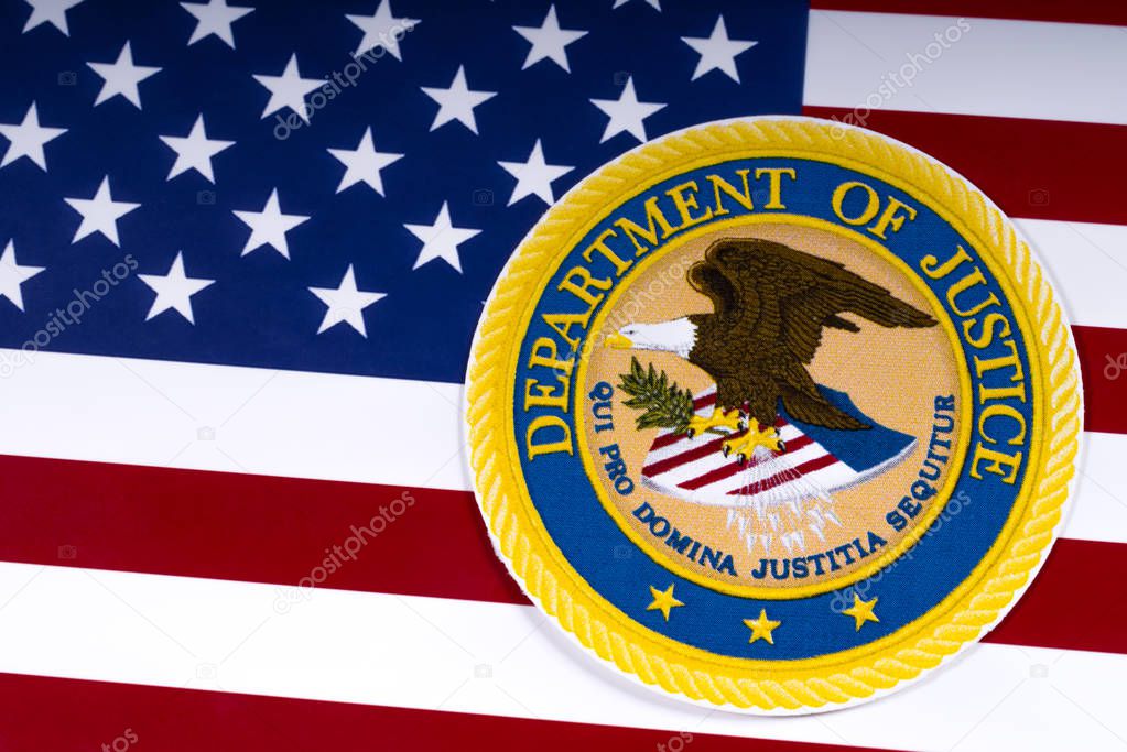 LONDON, UK - MARCH 26TH 2018: The symbol of the United States Department of Justice portrayed with the US flag, on 26th March 2018.