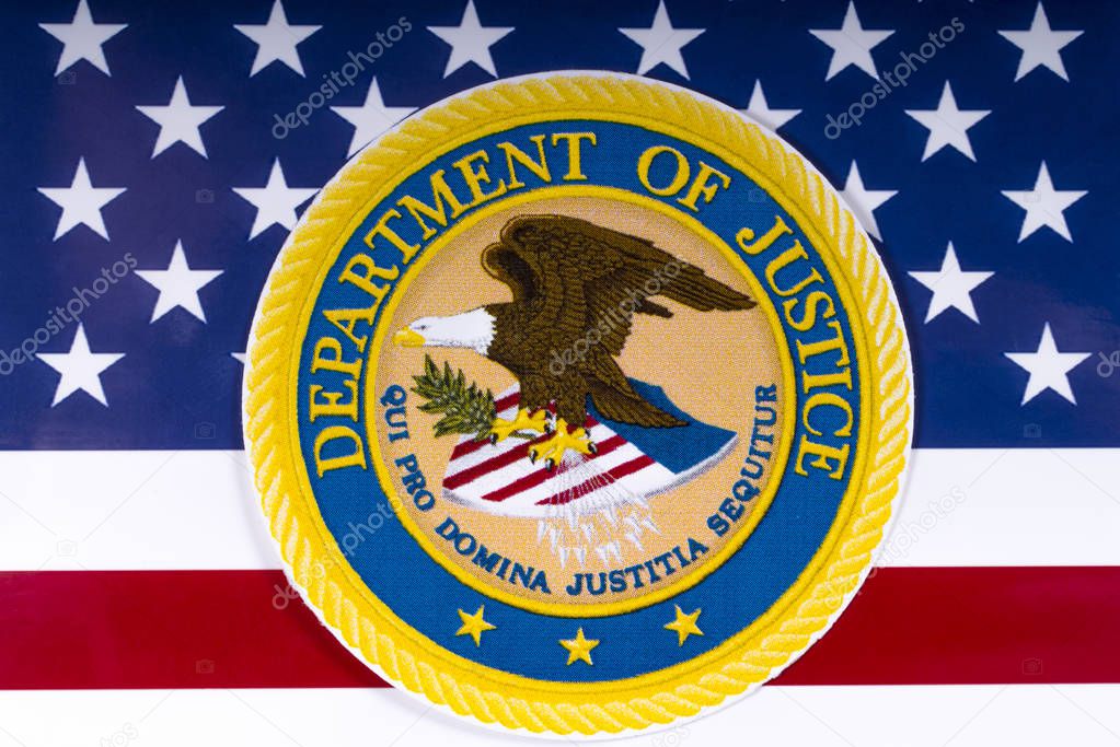 LONDON, UK - MARCH 26TH 2018: The symbol of the United States Department of Justice portrayed with the US flag, on 26th March 2018.