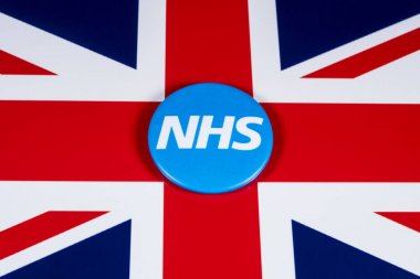 Londra, İngiltere - 27th Nisan 2018: Ulusal Sağlık Servisi simgesi üzerinde İngiltere'de bayrak, 27 Nisan 2018. Nhs 2 Dünya Savaşı önemli sosyal reformlar biri olarak 1948 yılında kurulmuştur.