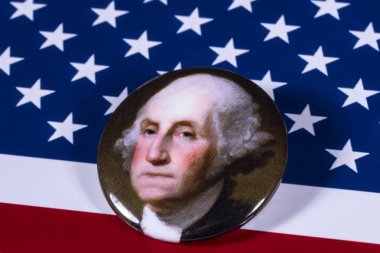Londra, İngiltere - 27th Nisan 2018: ABD bayrağı üzerinde 27 Nisan 2018 resimde A George Washington rozeti. Washington, Amerika Birleşik Devletleri ve bir kurucu babası 1 başkandı. 