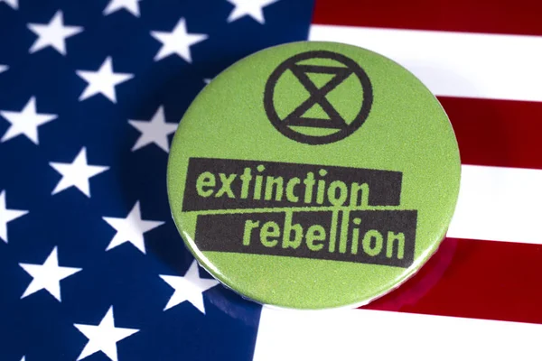 Symbole de rébellion d'extinction et drapeau des États-Unis — Photo