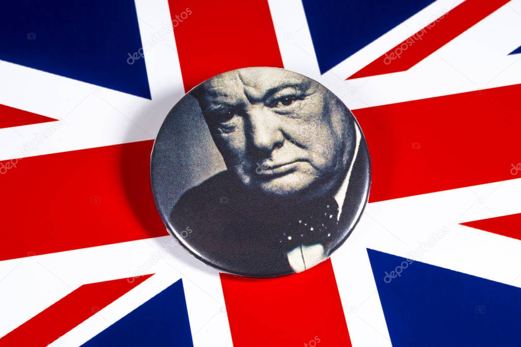 London, UK - November 22nd 2019: A badge with a portrait of Sir Winston Churchill, pictured over the flag of the United Kingdom.