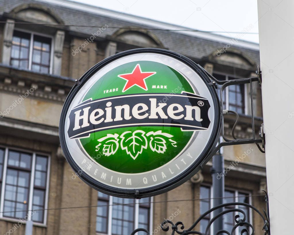 Amsterdam, Netherlands - December 22nd 2019: Close-up of a Heineken lager beer logo in the historic city of Amsterdam, Netherlands.