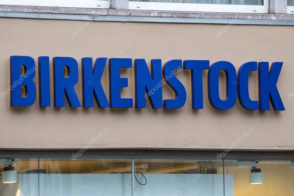 Bonn, Germany - February 17th 2020: The Birkenstock logo above the entrance to one of their retail stores in Bonn, Germany.