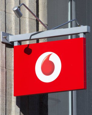 Bonn, Germany - February 17th 2020: The Vodaphone logo above the entrance to one of their stores in the city of Bonn in Germany.