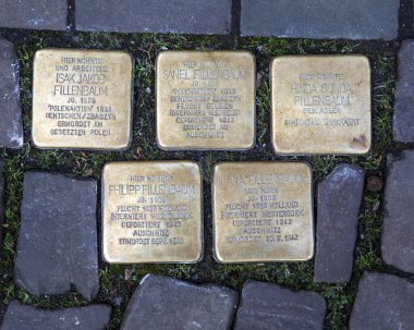 Cologne, Germany - February 19th 2020: Stolpersteins, or Stumbling Blocks, in Cologne, Germany. Stumbling blocks are plaques in the ground inscribed with the name and dates of victims of Nazi extermination or persecution.