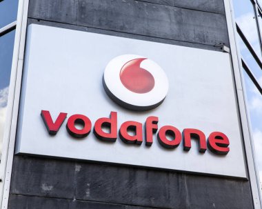Cologne, Germany - February 19th 2020: The Vodaphone logo above the entrance to one of their stores in the city of Cologne, Germany.
