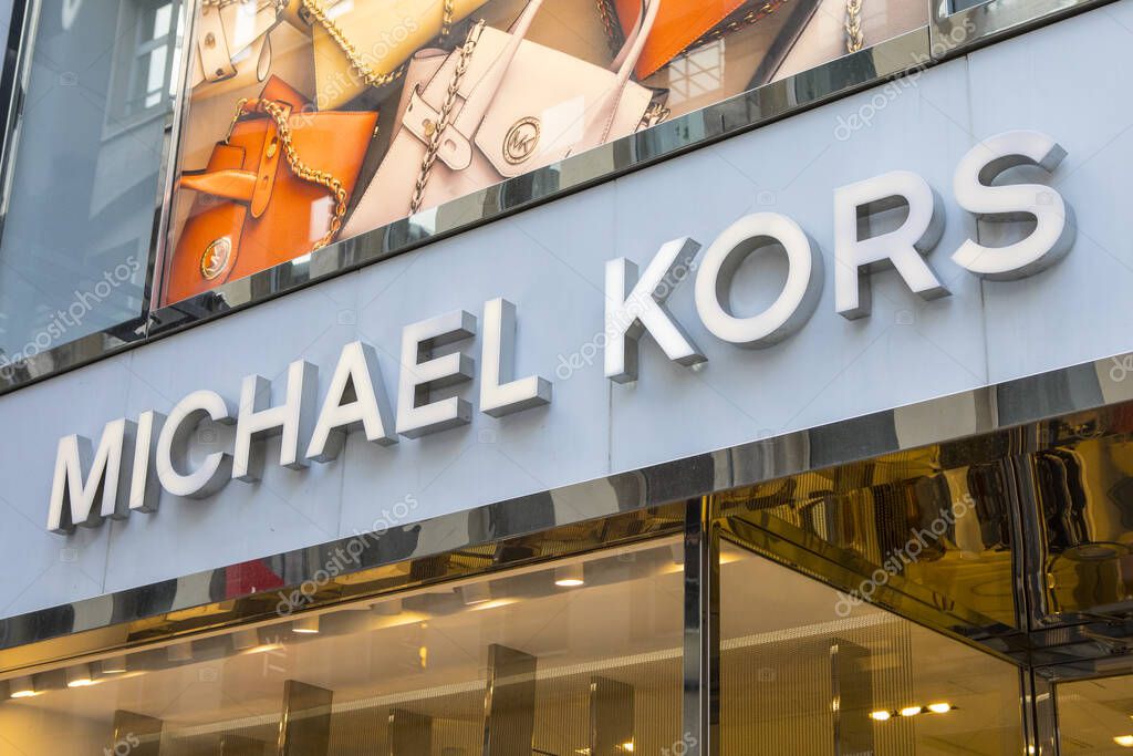 Cologne, Germany - February 19th 2020: The Michael Kors logo above the entrance to one of their stores in the city of Cologne, Germany.