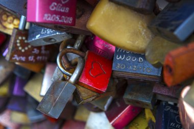 Cologne, Germany - February 20th 2020: Love Locks on the famous Hohenzollern Bridge in the city of Cologne, Germany. 