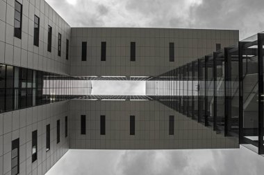 Cologne, Germany - February 20th 2020: Looking up at one of the impressive Kranhauser, or Crane Houses, in the Rheinauhafen in Cologne, Germany.