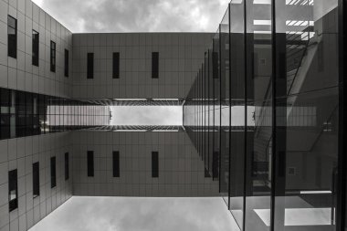 Cologne, Germany - February 20th 2020: Looking up at one of the impressive Kranhauser, or Crane Houses, in the Rheinauhafen in Cologne, Germany.