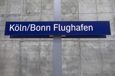 Cologne, Germany - February 16th 2020:A sign on the railway platform of Koln Bonn Flughaven - meaning Cologne Bonn Airport in Germany.