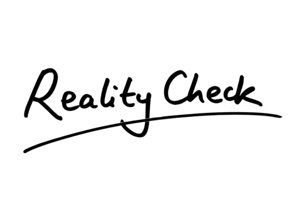 Reality Check handwritten on a white background.