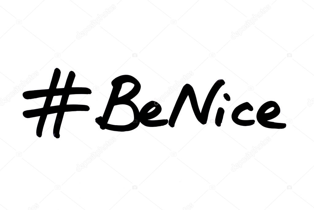 Hashtag Be Nice handwritten on a white background.