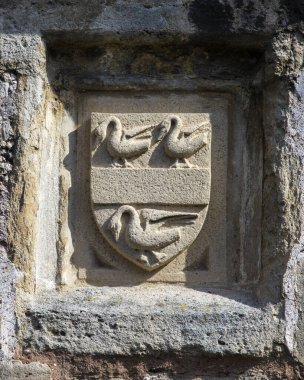 Wells, Somerset, İngiltere 'deki Vicars Close' daki bir binanın mimari ayrıntıları. Avrupa 'da ayakta kalan orijinal binaları olan en eski ve tamamen yerleşim yeri olduğu iddia ediliyor..
