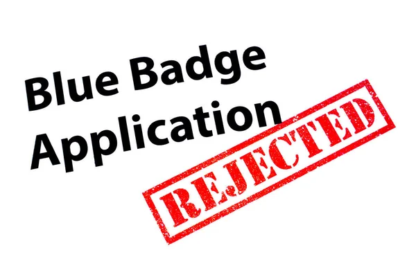 蓝色徽章申请标题为 经修订的红色橡皮图章 — 图库照片