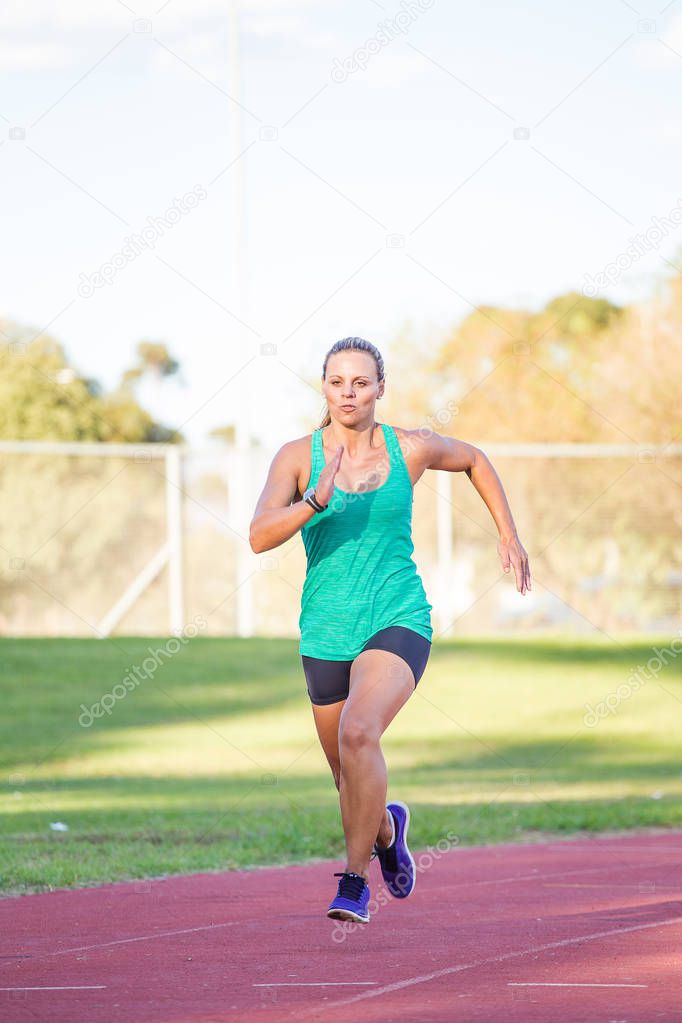 Fit female athlete spring