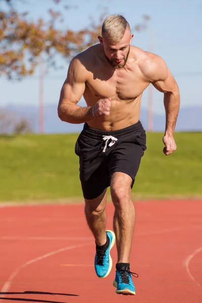 Atleta masculino corriendo —  Fotos de Stock