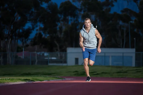 Male fitness model training for sprinting
