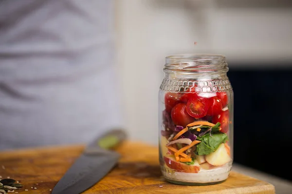 Healthy fresh salad in a jar