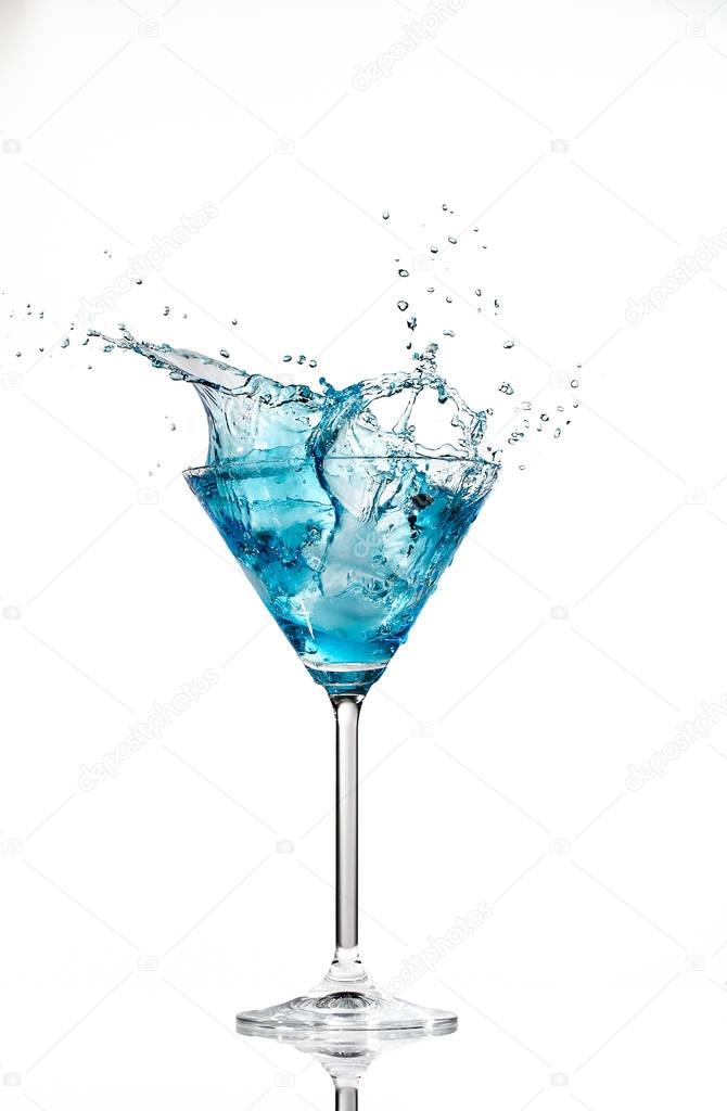  blue cocktail in a martini glass