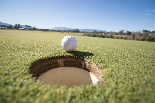 Close up wide angle image of a golf ball — Stock Photo, Image