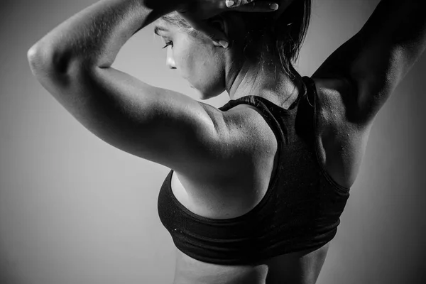 Female fitness model exercising