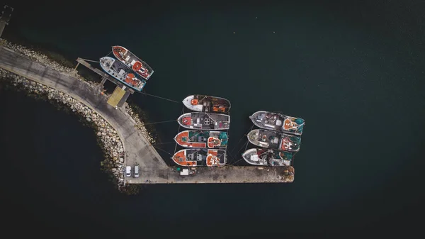 Fishing vessels laying at anchor in the harbor — Stock Photo, Image