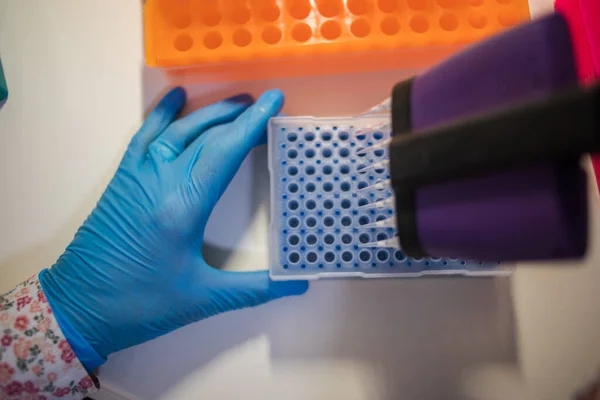 Close up image of laboratory instruments being used to test vaccines and drugs for viruses and DNA