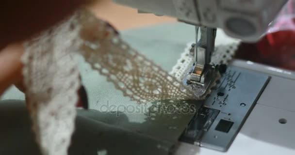 Woman scribbles on a sewing machine — Stock Video