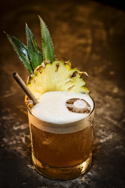 Pineapple mango tropical rum cocktail drink in bar — Stock Photo, Image