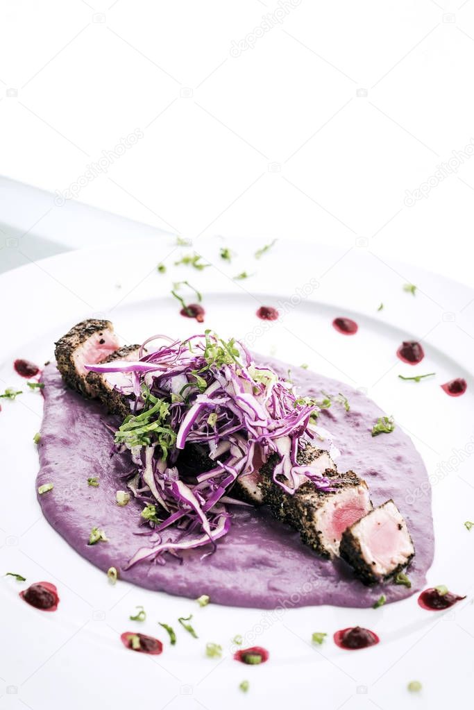 gourmet asian fusion seared tuna and sesame in beetroot sauce