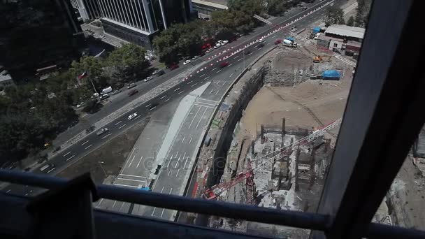 Vista panorámica de la ciudad con construcción — Vídeos de Stock