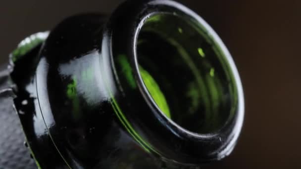 Champagne bottle while being poured — Stock Video